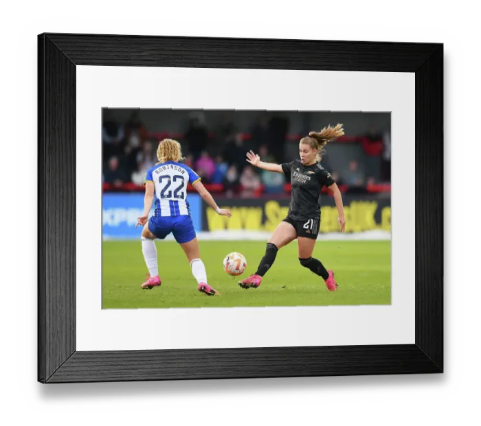 Framed Print : Battling it Out: Arsenal vs. Brighton & Hove Albion - FA Women's Super League