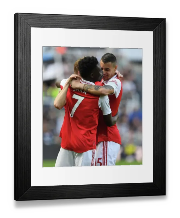 Framed Print : Arsenal Celebrate First Goal Against Newcastle United in 2022-23 Premier League Clash
