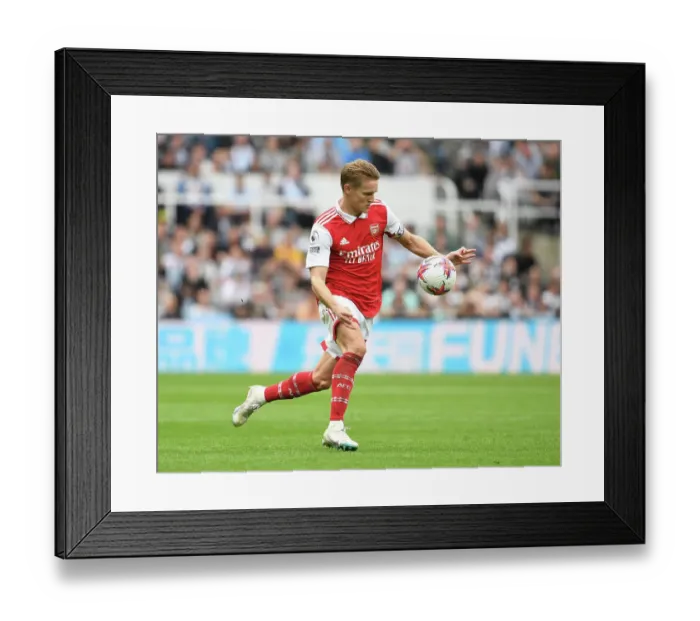 Framed Print : Martin Odegaard's Brilliant Display: Arsenal's Victory over Newcastle United in the 2022-23 Premier League