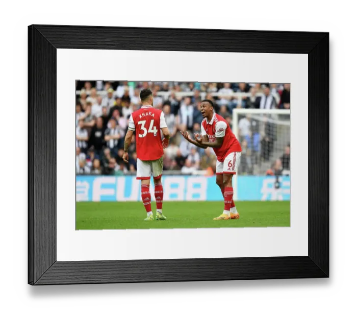 Framed Print : Arsenal: Gabriel and Xhaka's Intense Moment during Newcastle Clash (Premier League 2022-23) Framed Print : Arsenal: Gabriel and Xhaka's Intense Moment during Newcastle Clash (Premier League 2022-23)