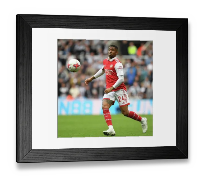 Framed Print : Reiss Nelson's Thrilling Performance: Arsenal vs. Newcastle United, Premier League 2022-23 - St. James Park