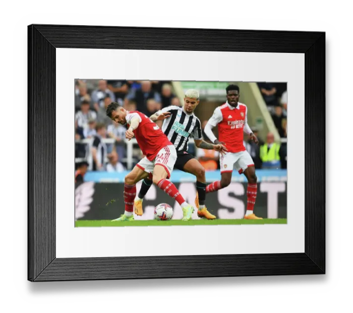 Framed Print : Battle for Possession: Xhaka vs. Guimaraes - Newcastle United vs. Arsenal FC, Premier League 2022-23