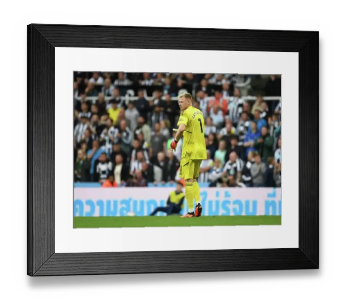 Framed Print : Arsenal's Aaron Ramsdale Faces Off Against Newcastle United in Intense Premier League Showdown (2022-23)