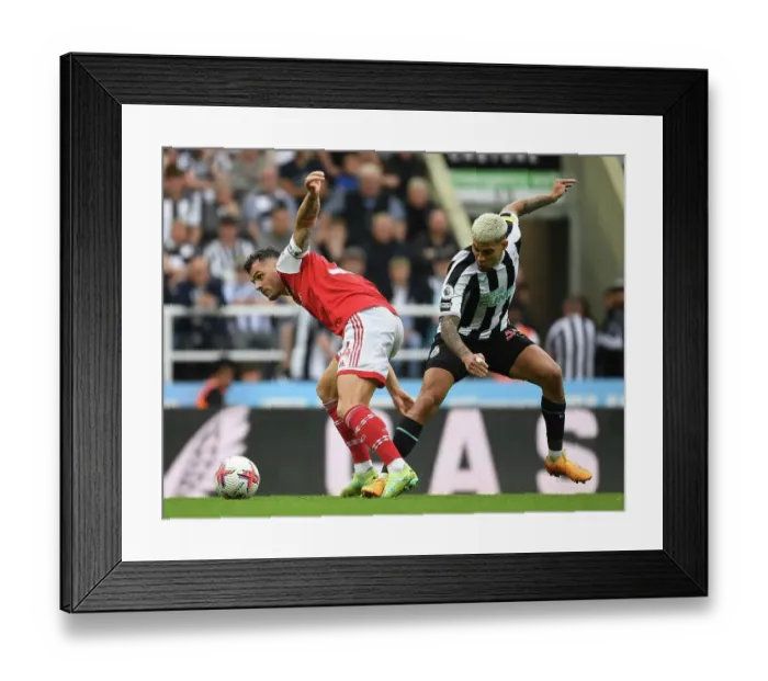 Framed Print : Xhaka vs Guimaraes: Battle in the Premier League - Newcastle United vs Arsenal FC (2022-23)
