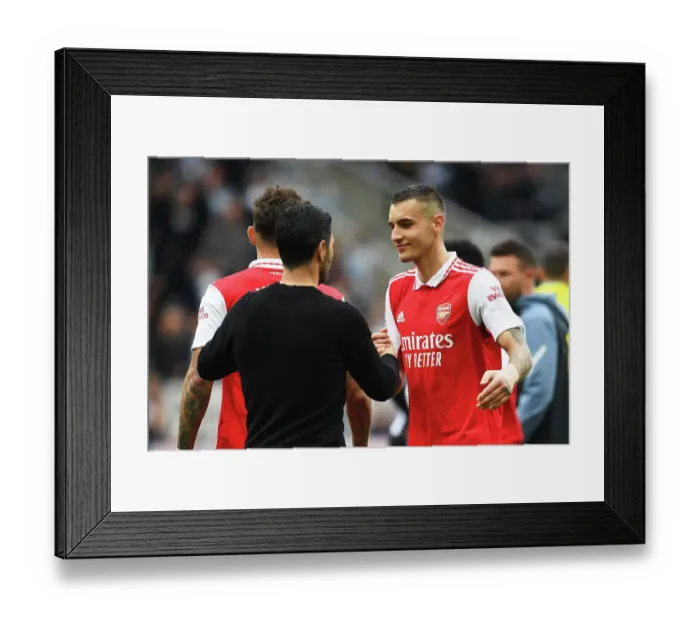 Framed Print : Arsenal Clinch Premier League Title: Emotional Reaction from Mikel Arteta and Jakub Kiwior