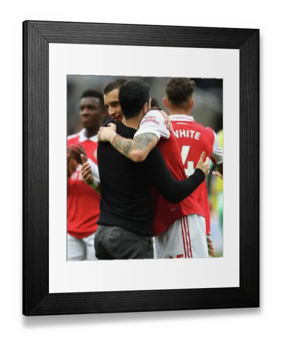 Framed Print : Arsenal's Triumph at Newcastle: Arteta and Kiwior Celebrate