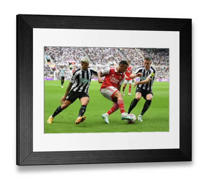 Framed Print : Gabriel Jesus Faces Off Against Bruno Guimaraes and Sven Botman in Intense Newcastle United vs. Arsenal FC Clash (Premier League 2022-23)