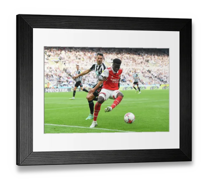 Framed Print : Bukayo Saka Faces Off Against Fabian Schaer: Intense Battle at St. James Park - Arsenal vs Newcastle United, Premier League 2022-23 Framed Print : Bukayo Saka Faces Off Against Fabian Schaer: Intense Battle at St. James Park - Arsenal vs Newcastle United, Premier League 2022-23
