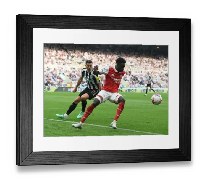 Framed Print : Bukayo Saka vs Fabian Schar: A Willpower Showdown at St. James Park - Arsenal vs Newcastle, Premier League 2022-23 Framed Print : Bukayo Saka vs Fabian Schar: A Willpower Showdown at St. James Park - Arsenal vs Newcastle, Premier League 2022-23