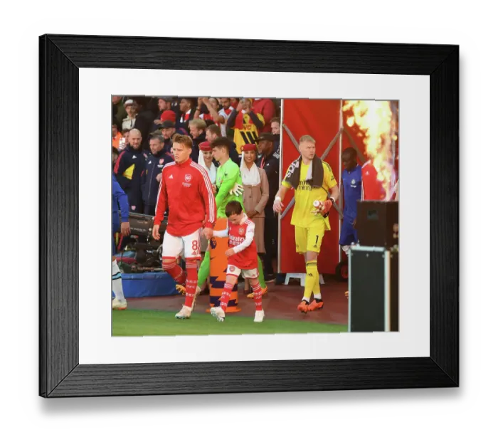 Framed Print : Arsenal's Martin Odegaard Meets the Mascot Before Arsenal vs. Chelsea Showdown (2022-2023) Framed Print : Arsenal's Martin Odegaard Meets the Mascot Before Arsenal vs. Chelsea Showdown (2022-2023)