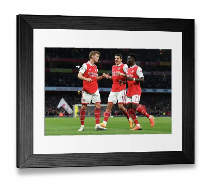 Framed Print : Arsenal Celebrate as Odegaard Scores First Goal Against Chelsea in 2022-23 Premier League Clash Framed Print : Arsenal Celebrate as Odegaard Scores First Goal Against Chelsea in 2022-23 Premier League Clash