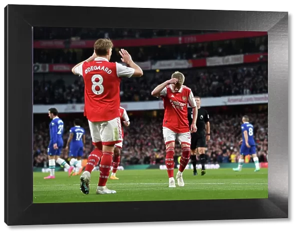 Arsenal Celebrate Odegaard's Goal: Arsenal FC vs Chelsea FC, Premier League 2022-23