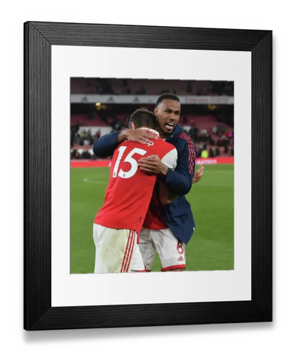 Framed Print : Arsenal Defenders Gabriel and Kiwior Celebrate Victory Over Chelsea in Premier League Showdown (2022-23) Framed Print : Arsenal Defenders Gabriel and Kiwior Celebrate Victory Over Chelsea in Premier League Showdown (2022-23)