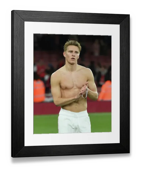 Framed Print : Arsenal's Martin Odegaard Celebrates with Fans after Arsenal vs. Chelsea Victory, Premier League 2022-23