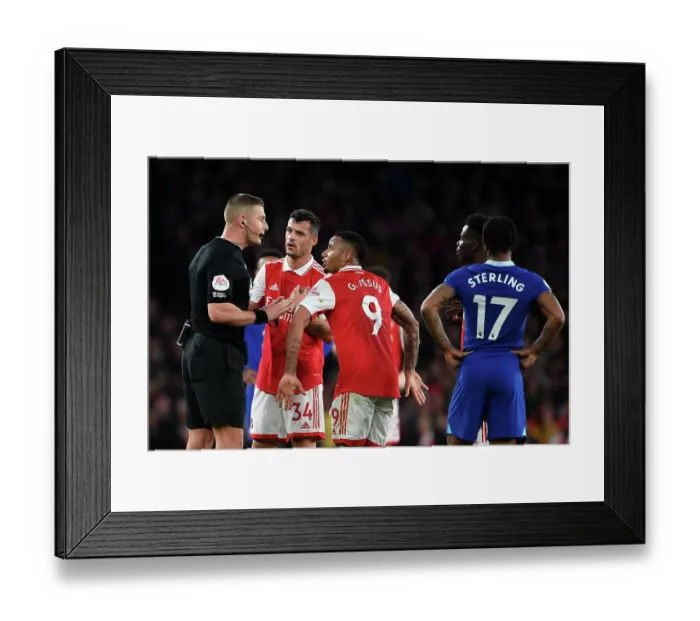 Framed Print : Arsenal vs. Chelsea: Xhaka and Jesus Confront Referee Jones in Intense Premier League Clash Framed Print : Arsenal vs. Chelsea: Xhaka and Jesus Confront Referee Jones in Intense Premier League Clash