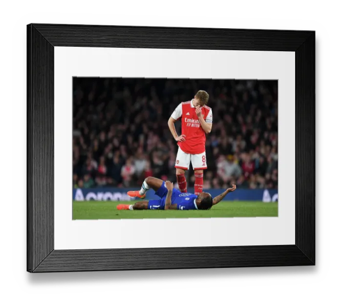 Framed Print : Arsenal's Martin Odegaard and Raheem Sterling Lock Eyes During Intense Arsenal v Chelsea Clash (2022-23) Framed Print : Arsenal's Martin Odegaard and Raheem Sterling Lock Eyes During Intense Arsenal v Chelsea Clash (2022-23)