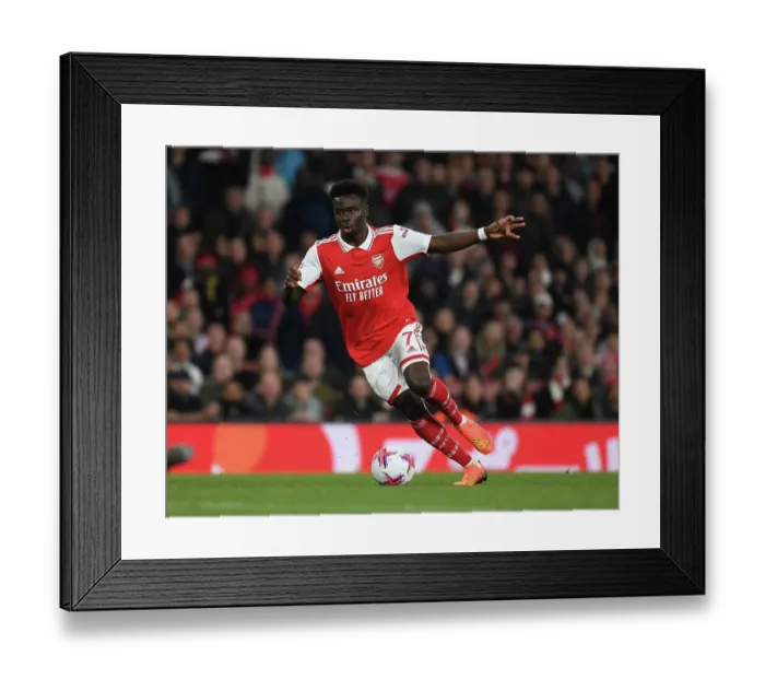 Framed Print : Arsenal's Bukayo Saka in Action: Thrilling Showdown between Arsenal and Chelsea, Premier League 2023, London