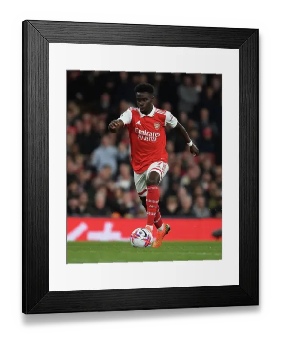 Framed Print : Arsenal's Bukayo Saka in Action Against Chelsea in the Premier League, London 2023 Framed Print : Arsenal's Bukayo Saka in Action Against Chelsea in the Premier League, London 2023