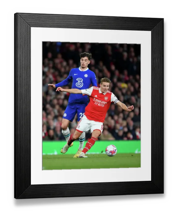 Framed Print : Battle for Possession: Odegaard vs. Havertz - Arsenal vs. Chelsea Rivalry in the Premier League