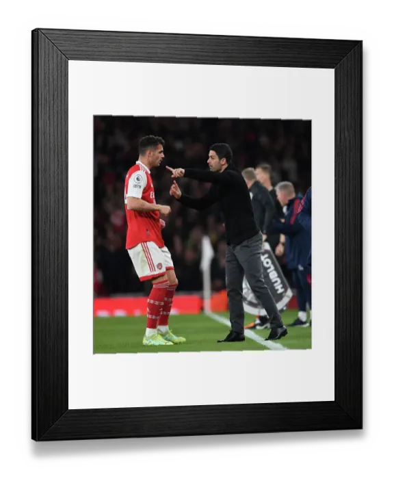 Framed Print : Arsenal's Mikel Arteta and Granit Xhaka: United in Focus during Arsenal vs. Chelsea (2022-23)