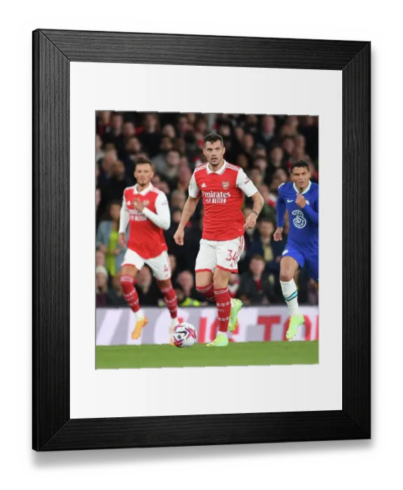 Framed Print : Arsenal's Granit Xhaka Faces Off Against Chelsea in Premier League Showdown (2022-23) Framed Print : Arsenal's Granit Xhaka Faces Off Against Chelsea in Premier League Showdown (2022-23)