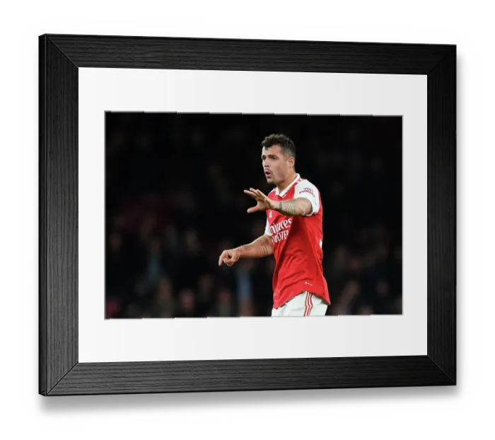 Framed Print : Arsenal's Granit Xhaka Gives Instructions Amidst Intense Arsenal v Chelsea Rivalry, Premier League 2022-23