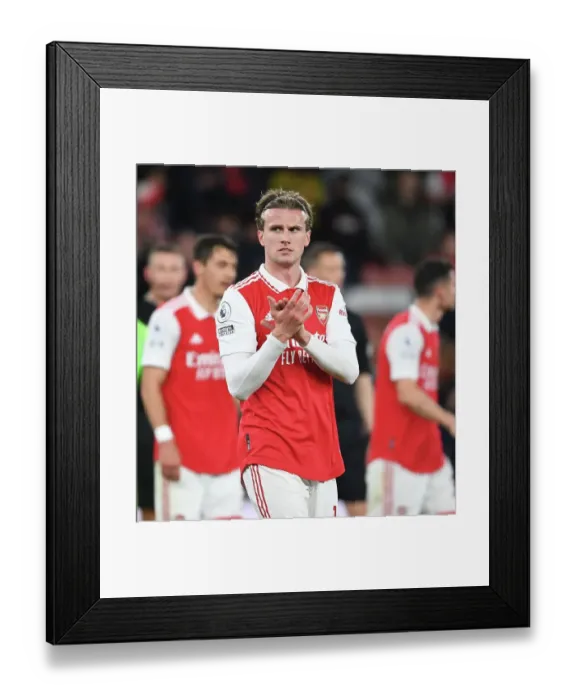 Framed Print : Arsenal Celebrate Victory Over Chelsea in Premier League Showdown