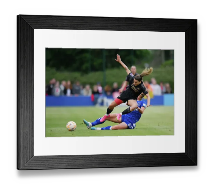 Framed Print : Queiroz Tackled by Stenevik: Everton vs. Arsenal Women's Super League Clash