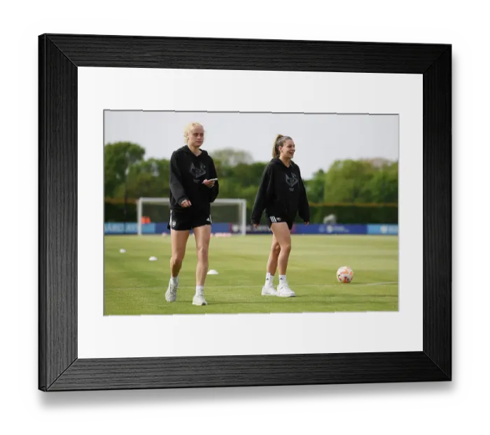 Framed Print : Arsenal Players Kathrine Kuhl and Gio Queiroz Inspecting the Pitch Before Everton vs Arsenal Women's Super League Match Framed Print : Arsenal Players Kathrine Kuhl and Gio Queiroz Inspecting the Pitch Before Everton vs Arsenal Women's Super League Match