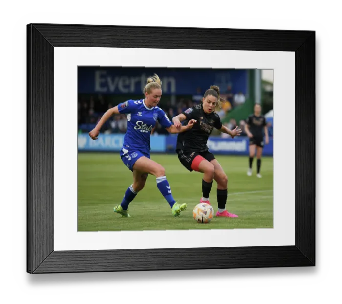 Framed Print : Gio Queiroz vs. Lucy Hope: Intense Battle for Possession in Everton vs. Arsenal Women's Super League Match