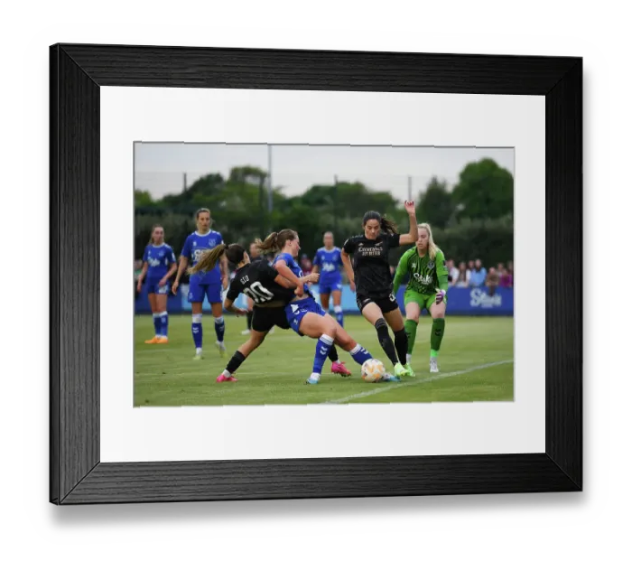 Framed Print : Arsenal vs. Everton: Intense Battle for Women's Super League Supremacy