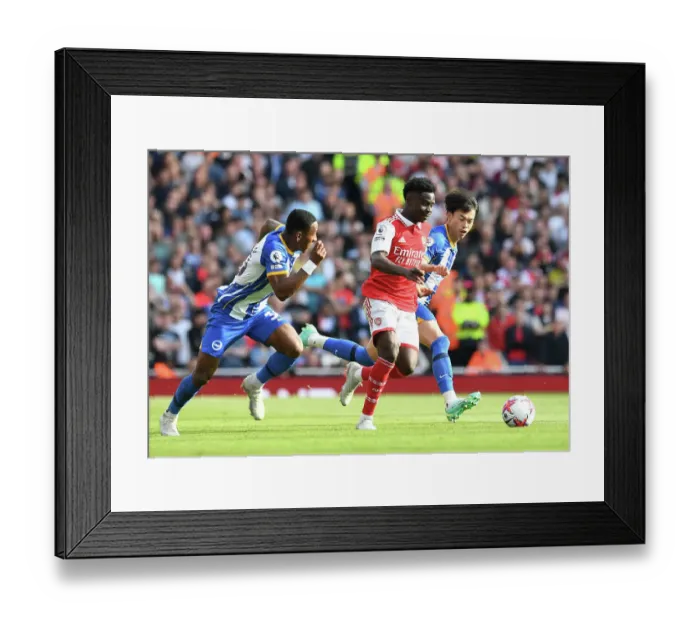 Framed Print : Saka vs Mitoma: Intense Face-Off in Arsenal's Battle Against Brighton (2022-23 Premier League) Framed Print : Saka vs Mitoma: Intense Face-Off in Arsenal's Battle Against Brighton (2022-23 Premier League)