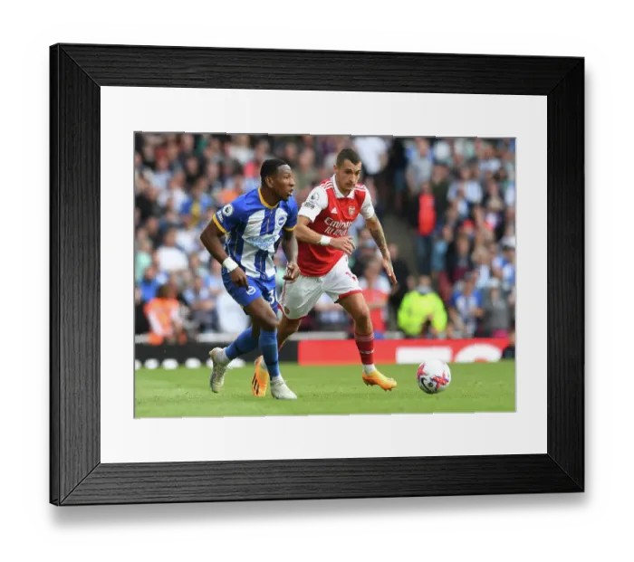 Framed Print : Arsenal vs. Brighton: Jakub Kiwior Closes Down Pervis Estupinan in Intense Premier League Clash (2022-23)