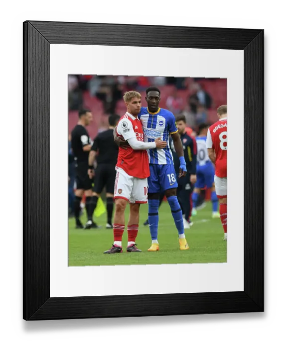 Framed Print : Arsenal's Emile Smith Rowe and Danny Welbeck Embrace Post-Match at Emirates Stadium (Arsenal v Brighton & Hove Albion, 2022-23)