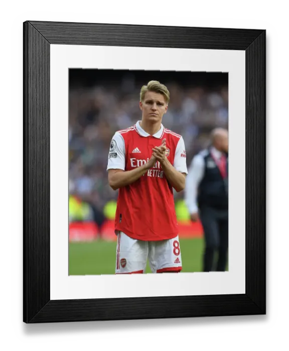 Framed Print : Martin Odegaard Celebrates after Arsenal's Victory over Brighton & Hove Albion (2022-23)