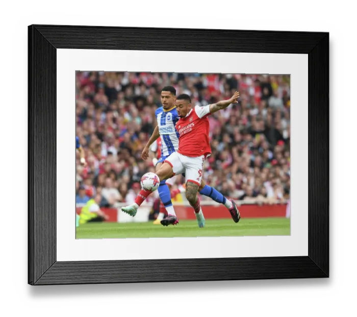 Framed Print : Arsenal vs Brighton: Gabriel Jesus Faces Off Against Levi Colwill in Intense Premier League Clash