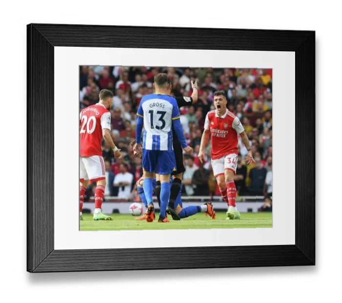 Framed Print : Arsenal's Granit Xhaka Controversially Argues with Referee during Arsenal v Brighton & Hove Albion Match, 2022-23
