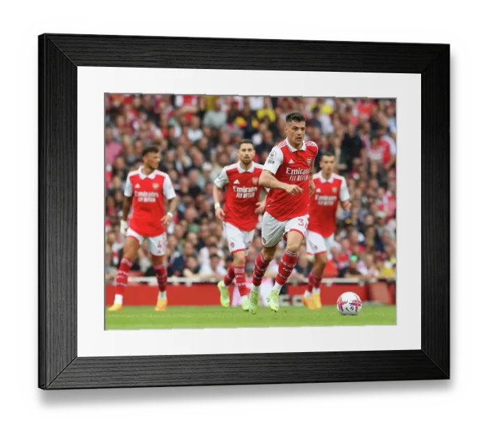 Framed Print : Granit Xhaka Charges Forward: Arsenal vs Brighton & Hove Albion, Premier League 2022-23