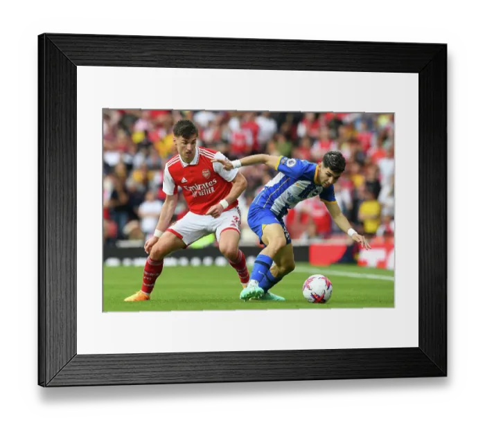 Framed Print : Determined Duel: Kieran Tierney's Battle for Ball Possession - Arsenal vs Brighton, 2022-23 Premier League