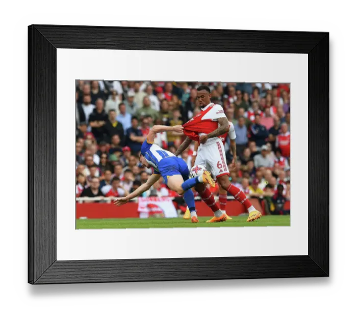 Framed Print : Arsenal vs Brighton: Intense Moment at Emirates Stadium