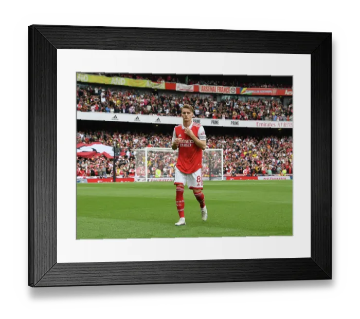 Framed Print : Arsenal's Martin Odegaard Gears Up Before Arsenal v Brighton & Hove Albion, Premier League 2022-23