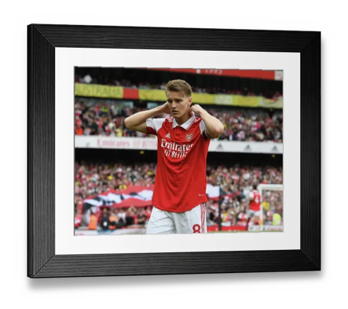 Framed Print : Arsenal's Martin Odegaard Prepares for Arsenal v Brighton & Hove Albion in Premier League 2022-23