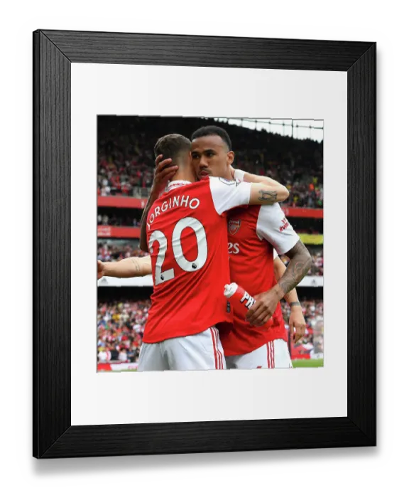 Framed Print : Arsenal's Embrace: Jorginho and Gabriel Unite Against Brighton in Premier League Showdown (2022-23)