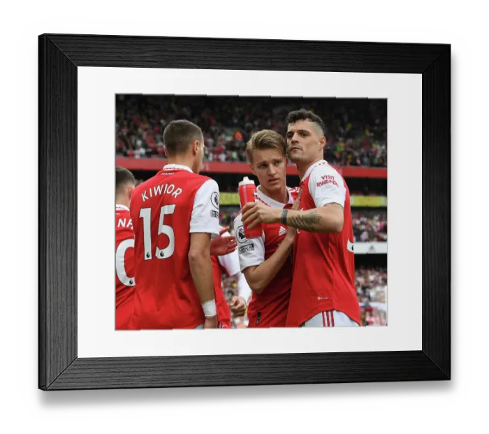 Framed Print : Arsenal's Martin Odegaard and Granit Xhaka Pre-Match Huddle vs Brighton & Hove Albion, Premier League 2022-23 Framed Print : Arsenal's Martin Odegaard and Granit Xhaka Pre-Match Huddle vs Brighton & Hove Albion, Premier League 2022-23