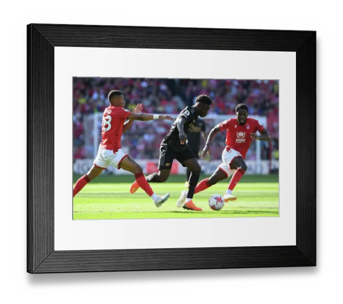 Framed Print : Bukayo Saka Charges Forward: Nottingham Forest vs. Arsenal FC, Premier League 2022-23