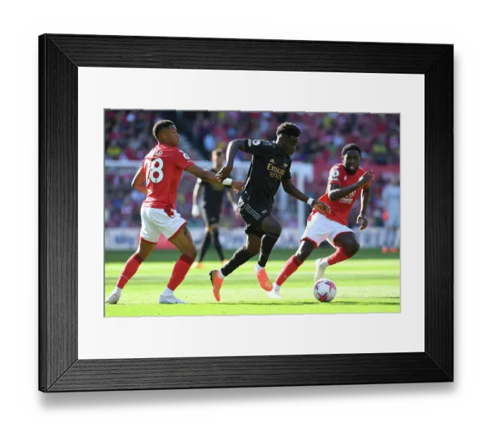 Framed Print : Charging Ahead: Bukayo Saka's Brilliant Performance Leads Arsenal to Victory over Nottingham Forest, Premier League 2022-23