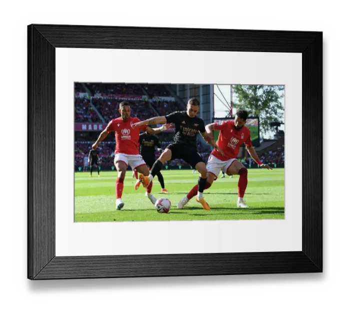 Framed Print : Intense Face-Off: Trossard vs. Lodi & Felipe - Nottingham Forest vs. Arsenal Premier League Clash Framed Print : Intense Face-Off: Trossard vs. Lodi & Felipe - Nottingham Forest vs. Arsenal Premier League Clash