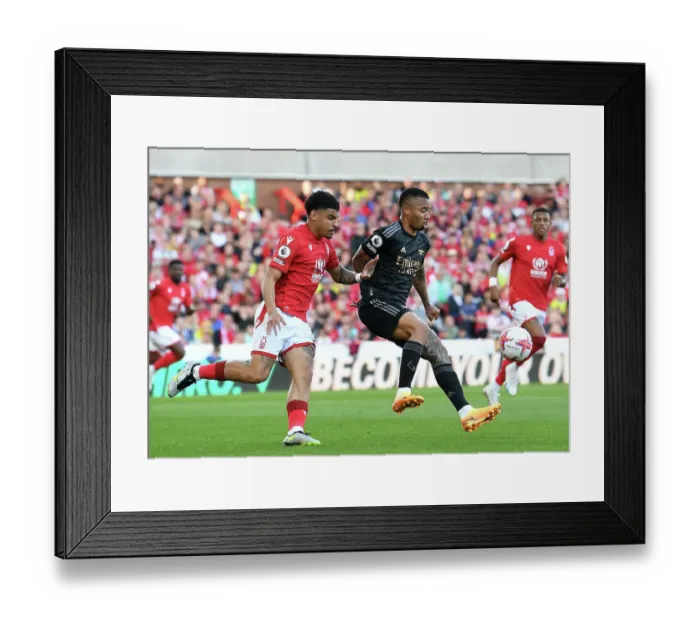 Framed Print : Gabriel Jesus vs Morgan Gibbs-White: Intense Clash in Nottingham Forest vs Arsenal FC Premier League Match