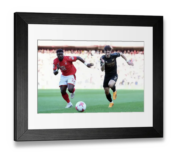 Framed Print : Intense Rivalry: Kieran Tierney vs. Serge Aurier - Arsenal vs. Nottingham Forest Showdown