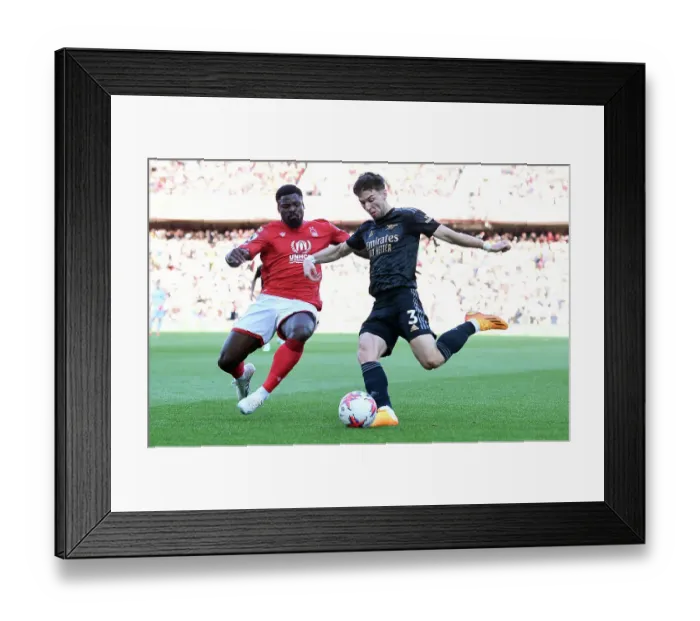 Framed Print : Arsenal's Kieran Tierney Goes Head-to-Head with Nottingham Forest: Premier League Showdown, May 2023